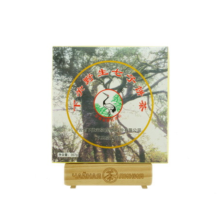 Прессованный шэн пуэр - Шэн пуэр 2005 г. "Чай с диких деревьев" марки "Сосна и журавль" завода "Сягуань" блин 357 г, 