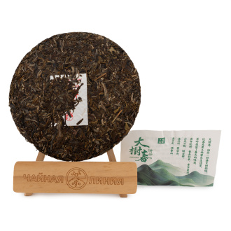 Прессованный шэн пуэр - Шэн пуэр 2024 года "Весенний урожай с больших деревьев" марки "Сягуань" 357 г, 